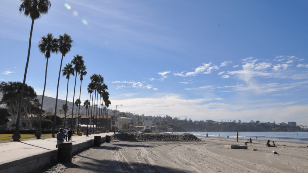 Overall Vibe: Beach Town Feel vs. Coastal City Buzz